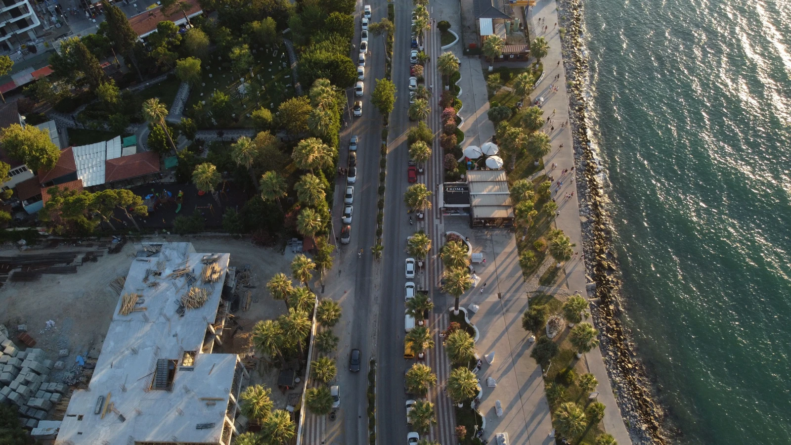 Saranda Embankment promenade walk with rental car parked nearby in Sarandë